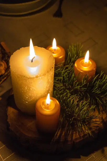 Christmas wreath with burning candles