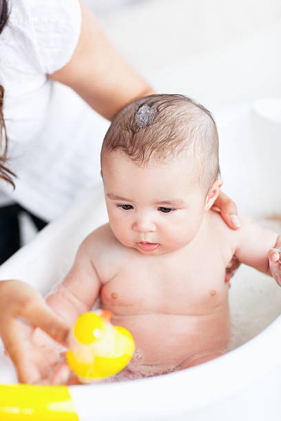 istock Adorable baby taking a bath 108805602
