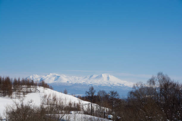 istock Blue sky and snow mountain Mt.Daisetuzan 1088058924