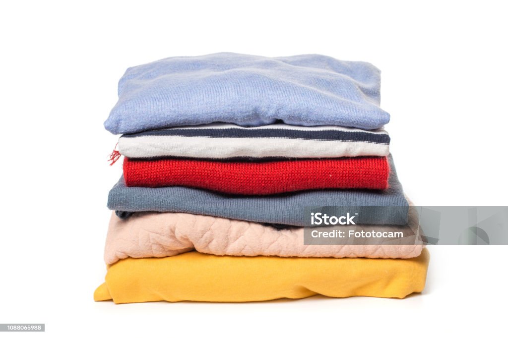 Stacks Of Folded Clothes On White Background Stock Photo - Download Image  Now - Clothing, Folded, Stack - iStock