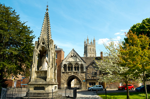 Picturesque old buildings around St Marys Gate near Gloucester Cathedral in spring sunshine, Gloucestershire, UK.