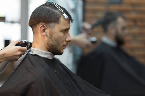 istock Young handsome man in barbershop 1088079940