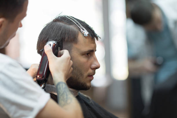 istock Young handsome man in barbershop 1088079944