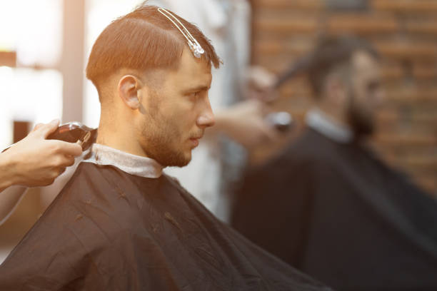 istock Young handsome man in barbershop 1088079962