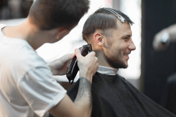 istock Young handsome man in barbershop 1088079978