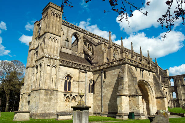 istock Malmesbury Abbey in spring sunshine 1088082012