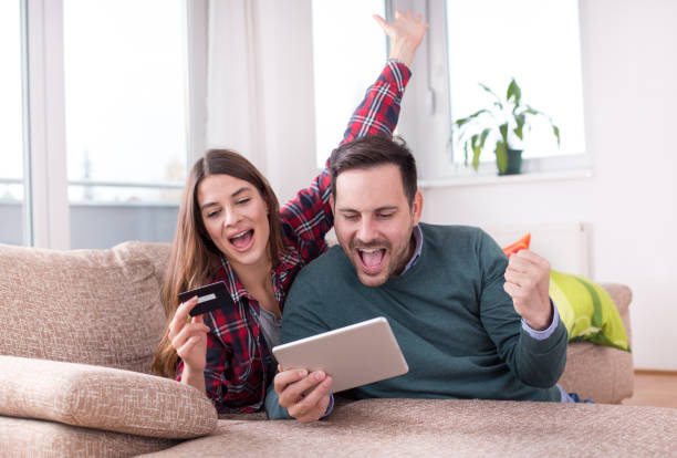 istock Couple buying online at home 1088090300