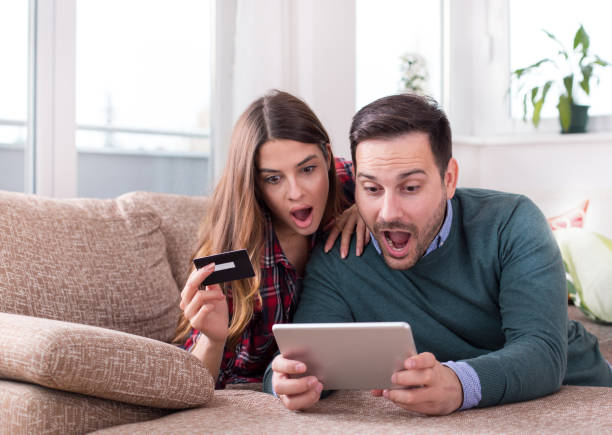 istock Couple buying online at home 1088090328