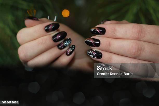 Manicure Nail Art Design For New Year Christmas Cat Eye Effect Black Purple Golden Chameleon Stock Photo - Download Image Now - iStock Manicure Nail Art Design For New Year Christmas Cat Eye Effect Black Purple Golden Chameleon Stock Photo - Download Image Now - iStock