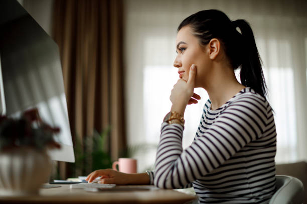 istock Successful young woman working at home 1088105110