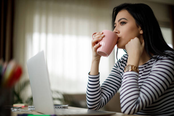 istock Young woman savoring her morning coffee 1088105344