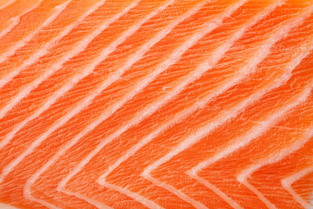 salmone rosso fresco tessuto - salmone frutto di mare foto e immagini stock