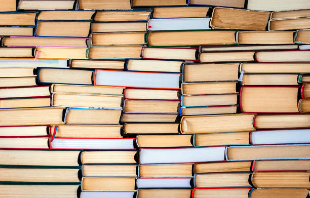 istock Stack of books education concept background, many books piles . 1088125642