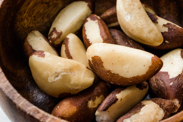 istock Brazil Nuts in Wooden Bowl without Shell 1088129658
