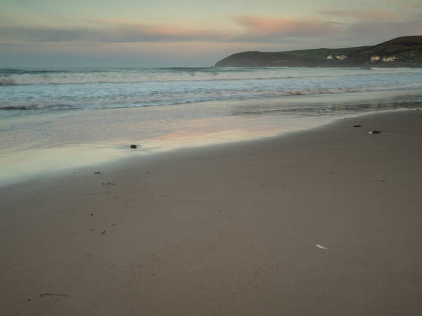beautiful Croyde beach in North Devon , England sunrise at Croyyde Bay in North Devon , England , a surfers paradise croyde bay photos stock pictures, royalty-free photos & images