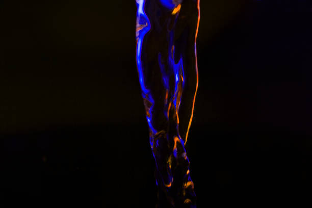 istock Red and blue neon background from water flow 1088133160
