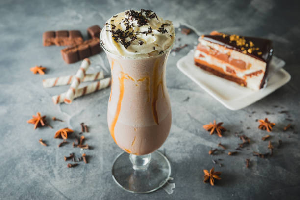 istock Chocolate milkshake with whipped cream, chocolate cake. 1088138450