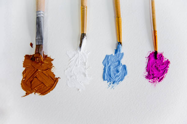 istock Artistic palette with paint brushes and oil paint 1088148114