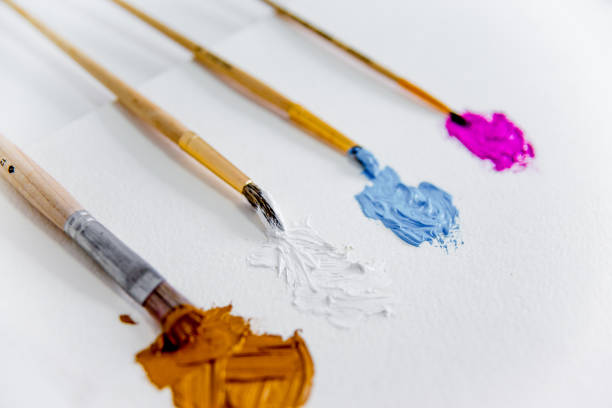 istock Artistic palette with paint brushes and oil paint 1088148122