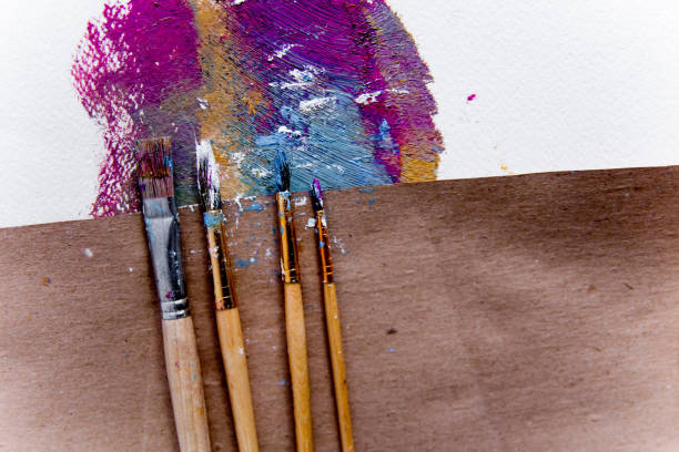 istock Artistic palette with paint brushes and oil paint 1088148366