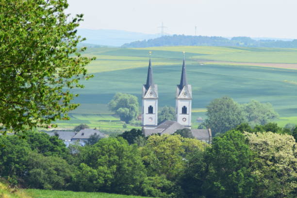 istock church towers over Polch 1088158336