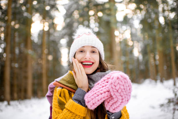 istock Young woman in pine forest during the winter 1088159946