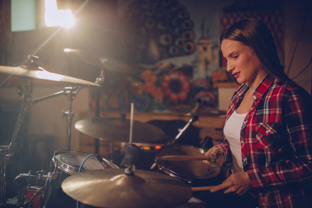 istock Female drummer playing in the club 1088163600