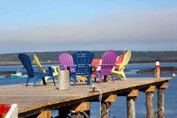 istock Plastic chairs on a small pier at Briar Island, Nova Scotia, Canada 1088169602