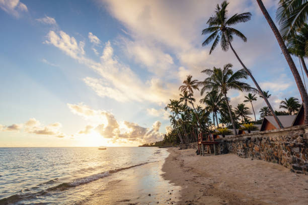 Beautiful sunset over the pacific ocean at scenic natural beach Viti Levu, Fiji. Korotogo Coast, South Coast, Western Division, Fiji, Oceania