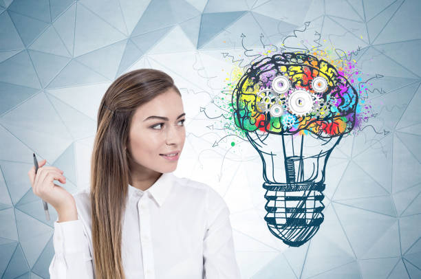 istock Smiling woman with pen, business thinking 1088171720