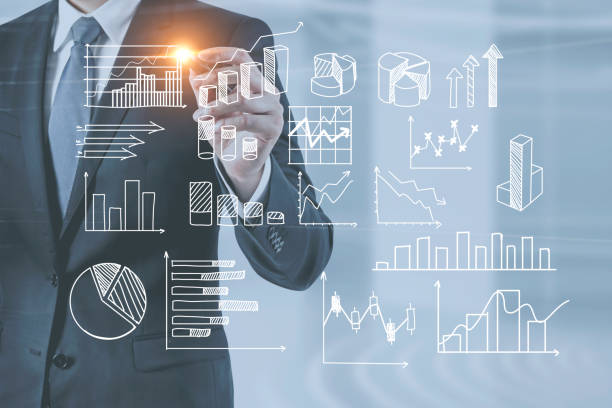 istock Businessman drawing types of graphs in office 1088175600