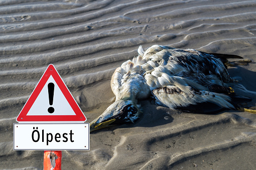 Warning sign oil spill