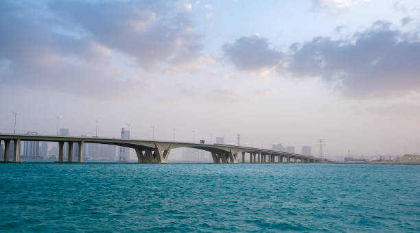 istock January 21, 2018: Khalifa Bridge against cloudy and misty sky, Abu Dhabi, UAE 1088184422