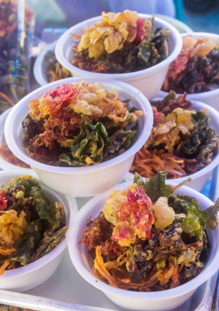 istock Traditional fried flowers and leaf snack in foam bowl 1088190612