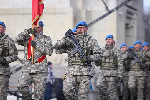 Bucharest, Romania - December 1, 2018: Turkish soldiers, holding MPT 76 assault rifles (7.62x51 mm NATO), take part at the Romanian National Day military parade