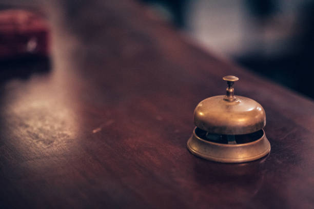 close up of a solid brass hotel front desk bell. - service bell fotos imagens e fotografias de stock