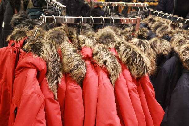 istock red jackets with a fake fur collar in a store 1088203156