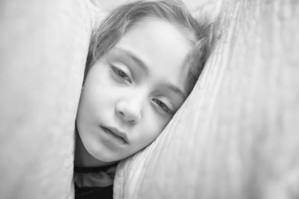 istock Little girl sleeping on pillows 1088205874
