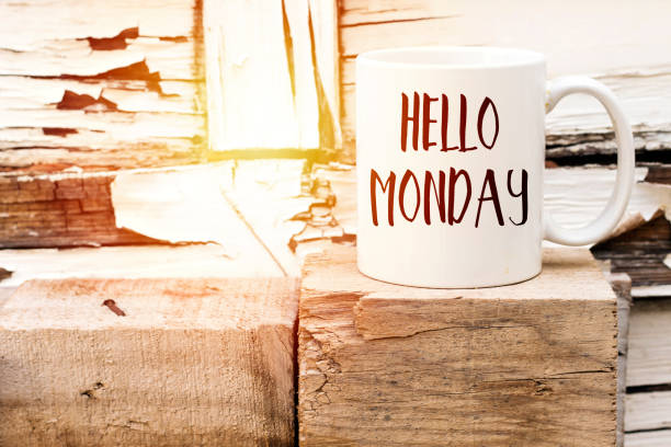 istock text HELLO MONDAY on cup of aromatic coffee on wooden cube 1088217262