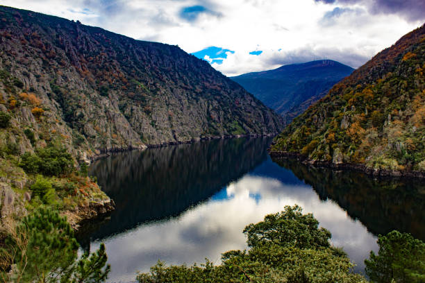 istock scenary reflecting in the river on a cloudy day 1088225012
