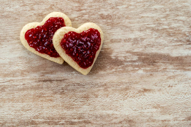 istock 2 heart-shaped sandwich bread with strawberry jam 1088232170