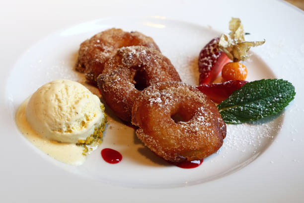 Apple donuts with icing sugar