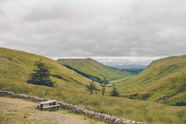 Glengesh Pass, Ireland, Majestic, Panoramic - Panoramic view of a picnic table situated at the edge of a summit at Glengesh Pass.