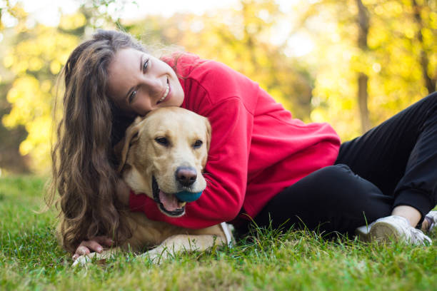 istock Young smiling woman with her cute dog 1088244182