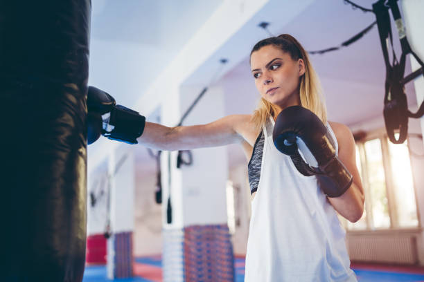 istock Woman boxing in the gym 1088244508