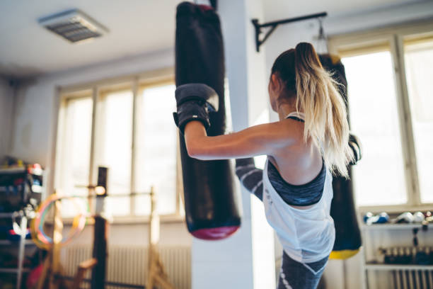 istock Woman boxing in the gym 1088245782