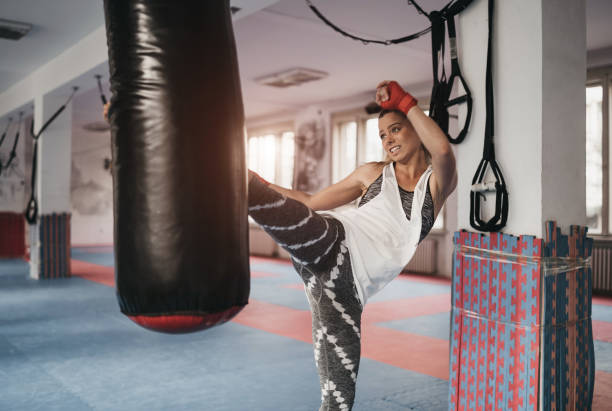 istock Woman boxing in the gym 1088247466