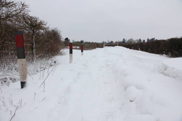 istock Country road blocked by snow 1088252800