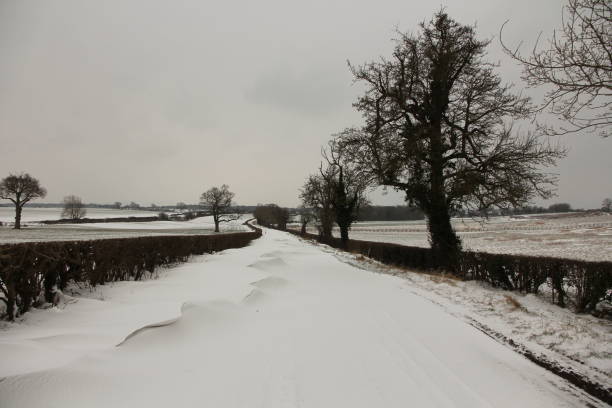 istock Deep snowdrifts across highway 1088252892