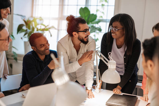 istock Cheerful and successful business team in the office 1088253236